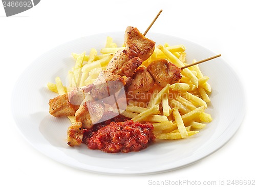 Image of grilled chicken meat and french fries 