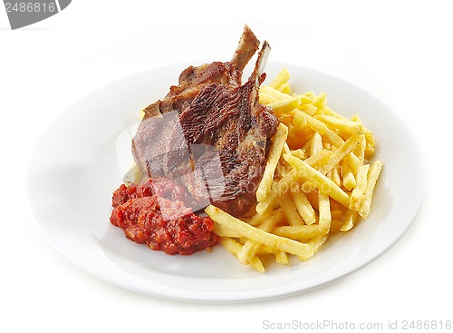 Image of grilled lamb meat and french fries