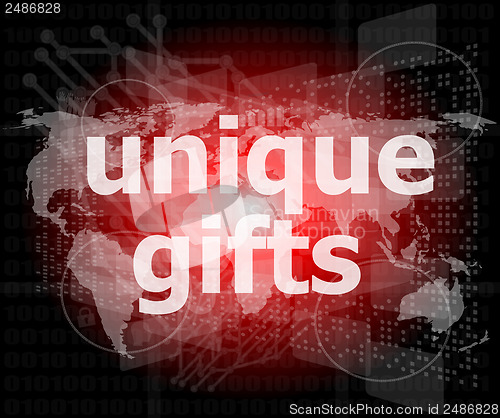 Image of unique gifts text on digital touch screen - holiday concept