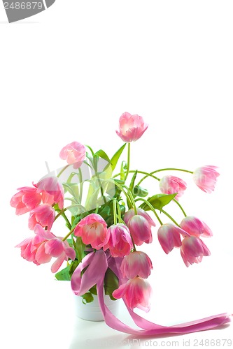 Image of Beautiful pink tulips in white pot