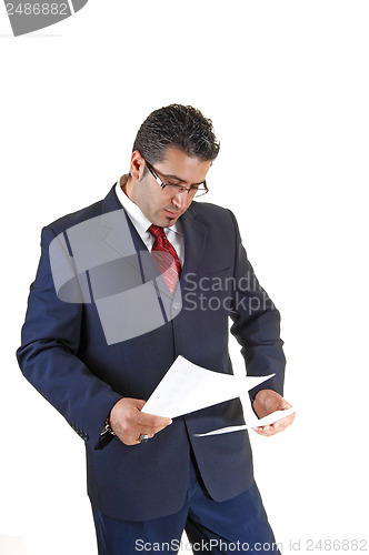 Image of Businessman reading.