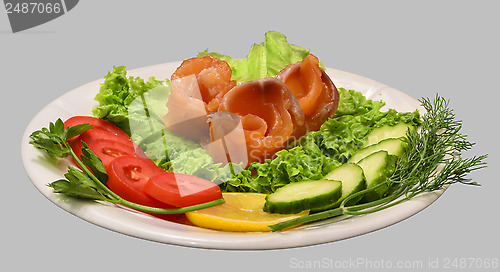 Image of Rolls of red fish fillet with vegetables