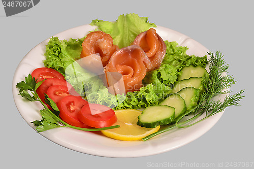 Image of Rolls of red fish fillet with vegetables