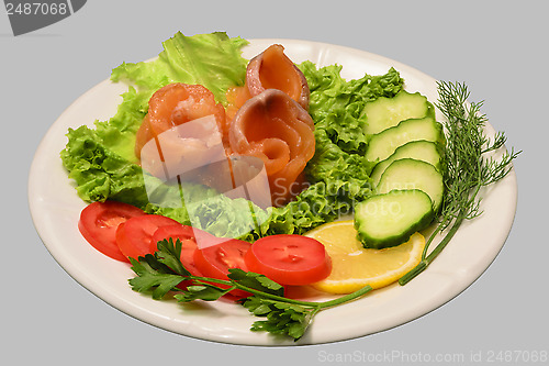 Image of Rolls of red fish fillet with vegetables