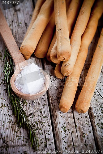 Image of bread sticks grissini with rosemary and salt 
