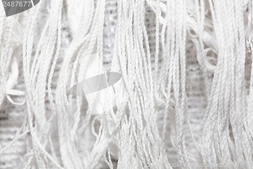 Image of white canvas texture background with filament