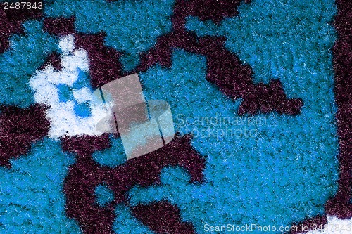 Image of Hand woven carpet pattern, close up view