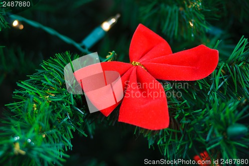Image of butterfly hanging on Christmas tree
