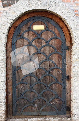 Image of Old wooden door from medieval era.