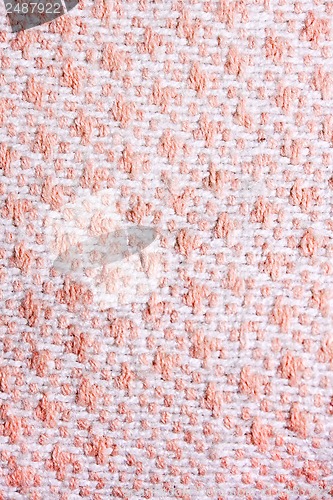 Image of woolen fabric with color blotches