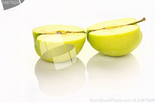 Image of sliced apple with reflection