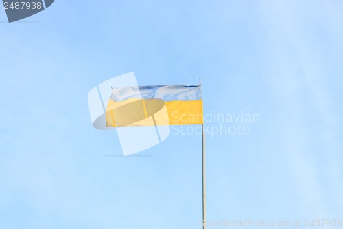 Image of Ukrainian flag on a background of sky