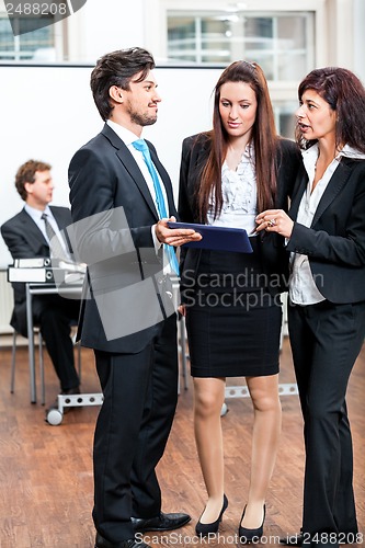Image of business people working in office teamwork 