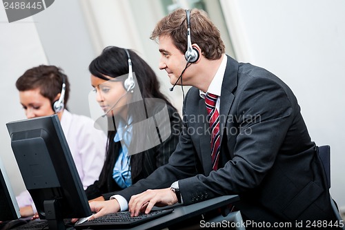 Image of smiling callcenter agent with headset support