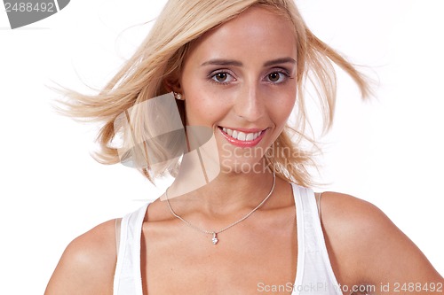 Image of attractive young smiling blonde woman isolated