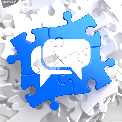 Image of White Speech Bubble Icon on Blue Puzzle.