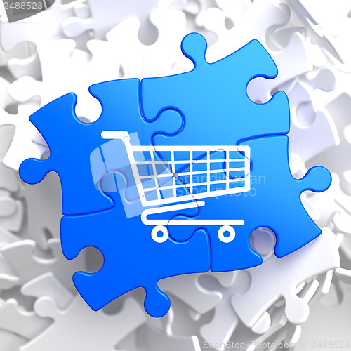 Image of Shopping Cart Icon on Blue Puzzle.