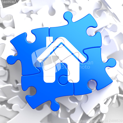 Image of Home Icon on Blue Puzzle.