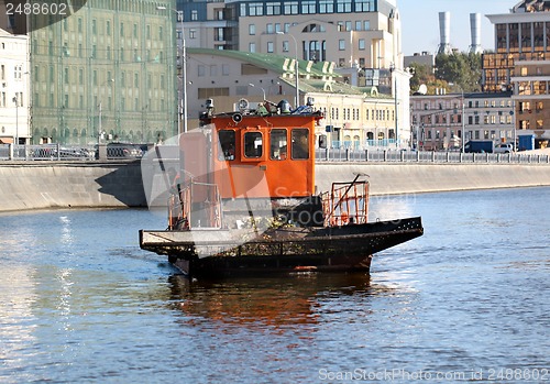 Image of The ship clears the river of debris