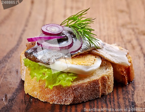 Image of bread with anchovies and egg