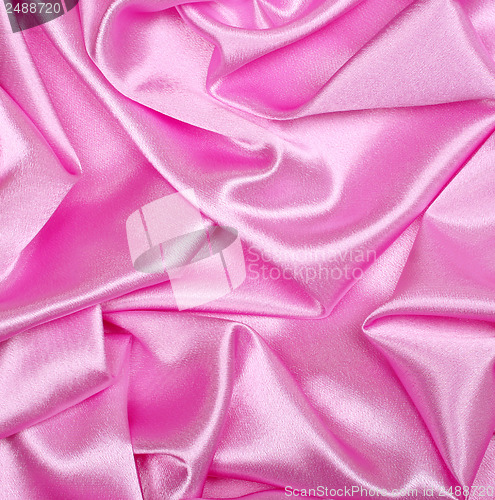 Image of Smooth elegant pink silk  as background 