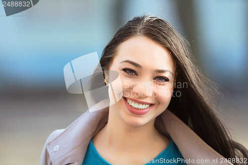 Image of Young cheerful brunette