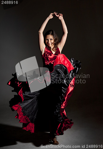 Image of Young woman dancing flamenco