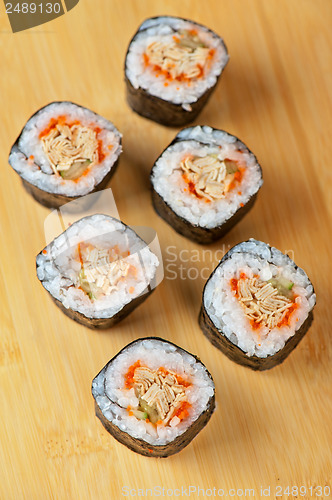 Image of sushi rolls with tobico and pancake