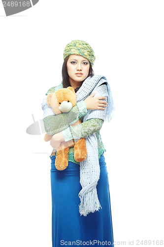 Image of Sad lady with toy