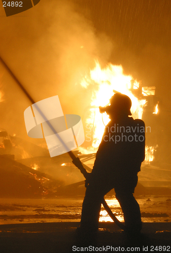 Image of firefighter in silhouette