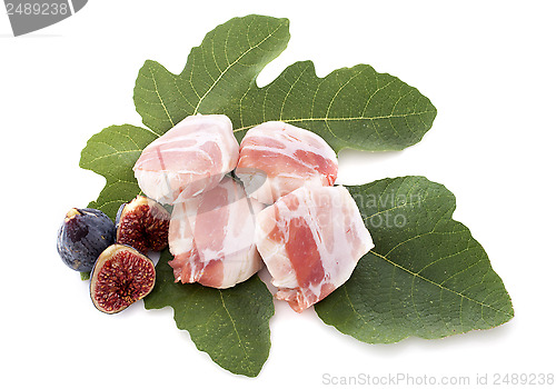 Image of cheese, bacon and fig