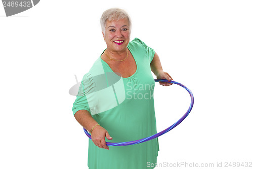 Image of Senior lady doing gymnastic