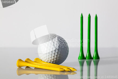 Image of Golf equipments on the table