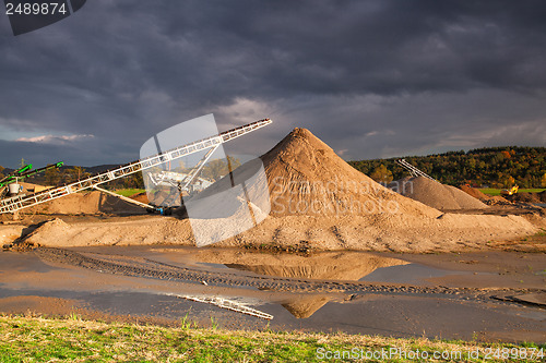 Image of Quarry sand on a bank of a river