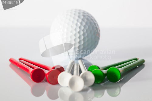 Image of Golf equipments on the table