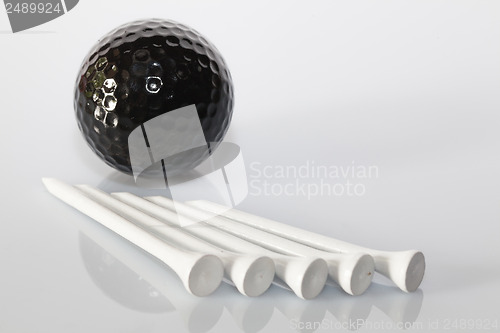 Image of Golf equipments on the table