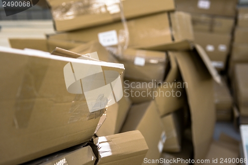 Image of Opened cardboard box in a building