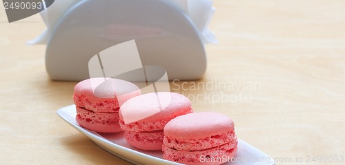 Image of pink macaron on a plate