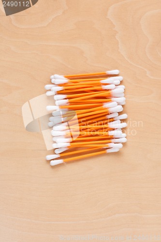 Image of Ear sticks scattered on a table