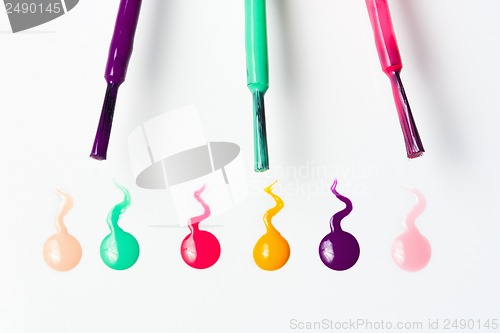 Image of brush strokes and colorful nail polish