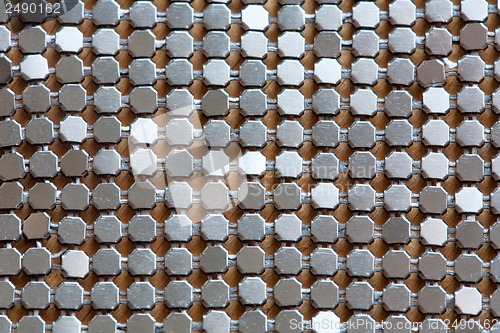 Image of Background of metal diamond plate in silver color.