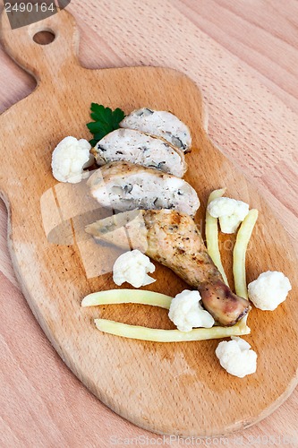 Image of Grilled barbecue chicken quarters