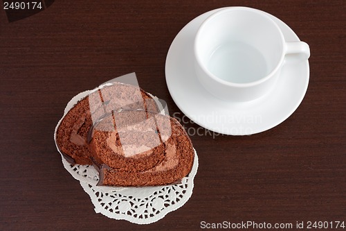 Image of Chocolate sacher cake on wooden table