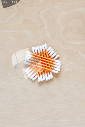 Image of Ear sticks scattered on a table