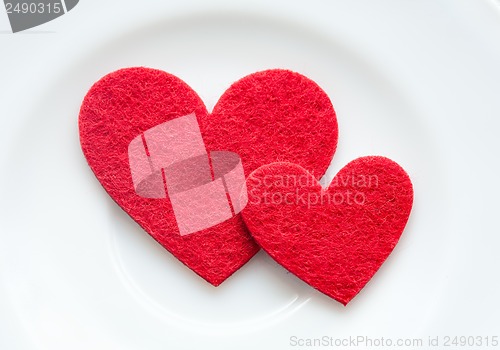 Image of Red hearts on a plate close-up. Valentine's Day