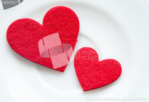 Image of Red hearts on a plate close-up. Valentine's Day