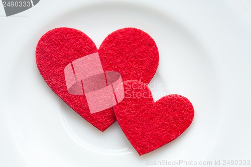 Image of Red hearts on a plate close-up. Valentine's Day