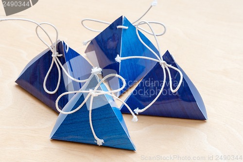 Image of gift bags on a white wooden background