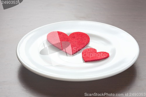 Image of Red hearts on a plate