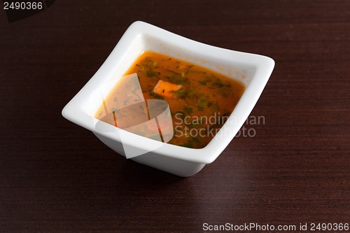 Image of Chicken Soup on wooden table